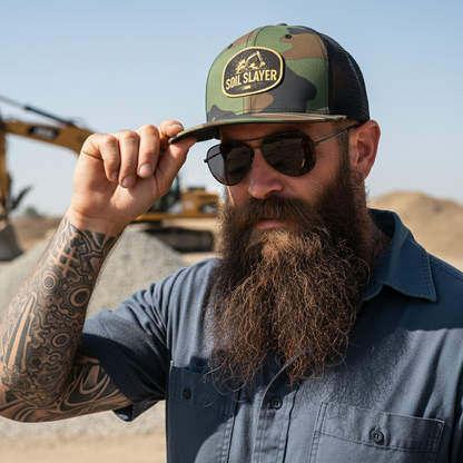 Soil Slayer hat on rugged bearded man with sunglasses